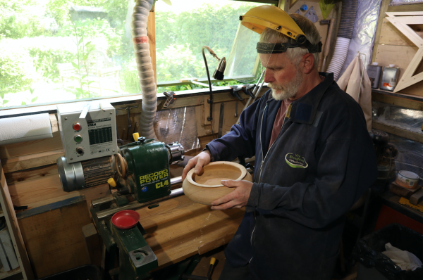 Viv - a keen user of epoxy resin - and a bowl he's crafted.