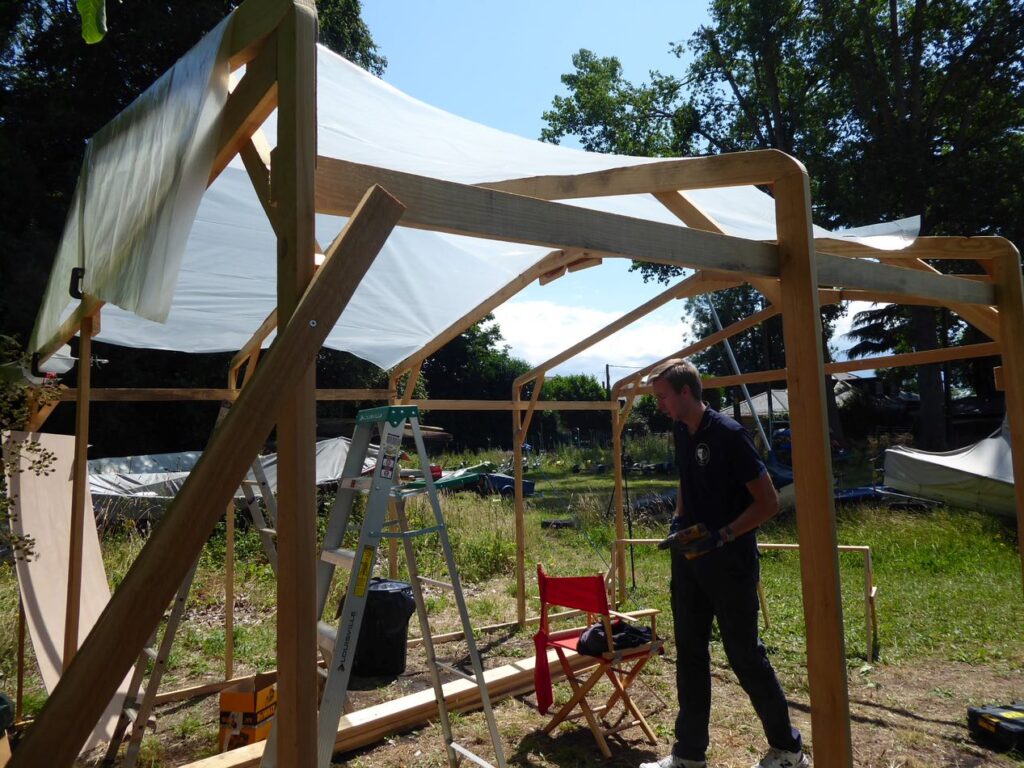 Tent frame to house the wooden dinghy boat building using west system epoxy 