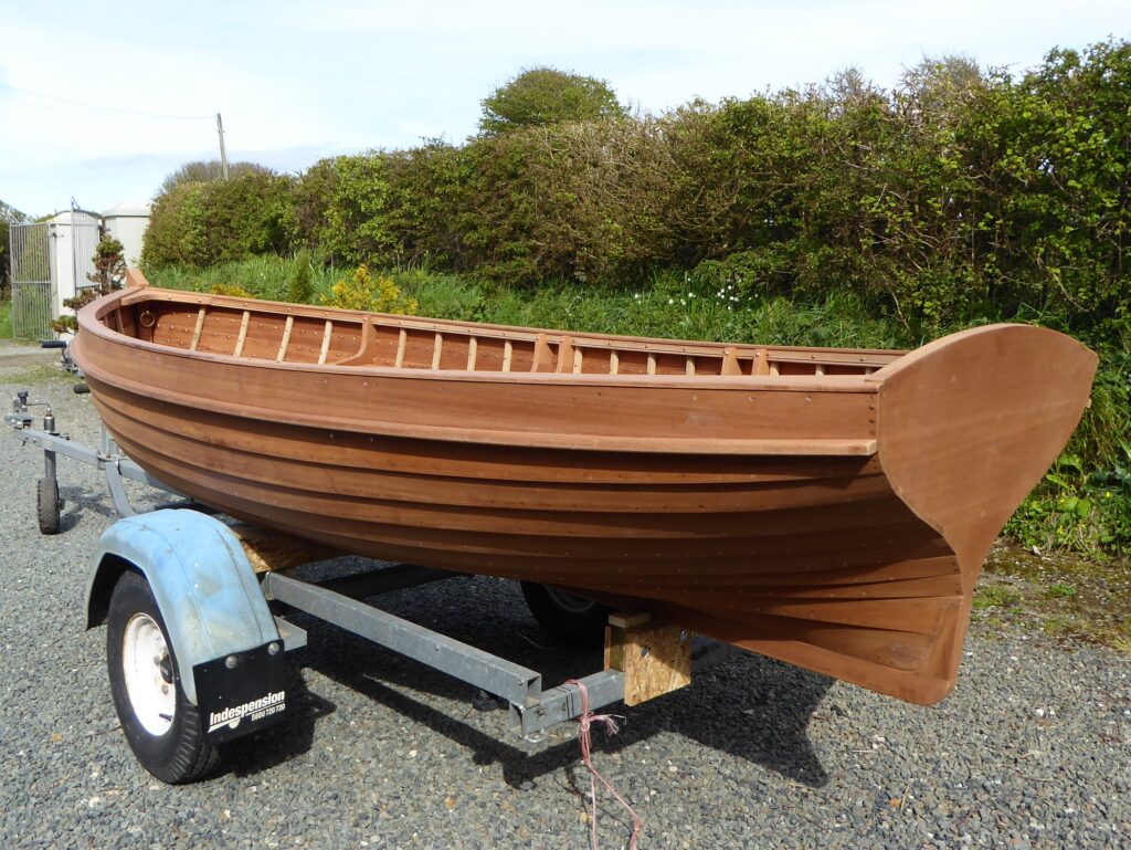 A boat made at the boat building academy in lyme regis incorporating west system epoxy into the build, sat on the Trailor