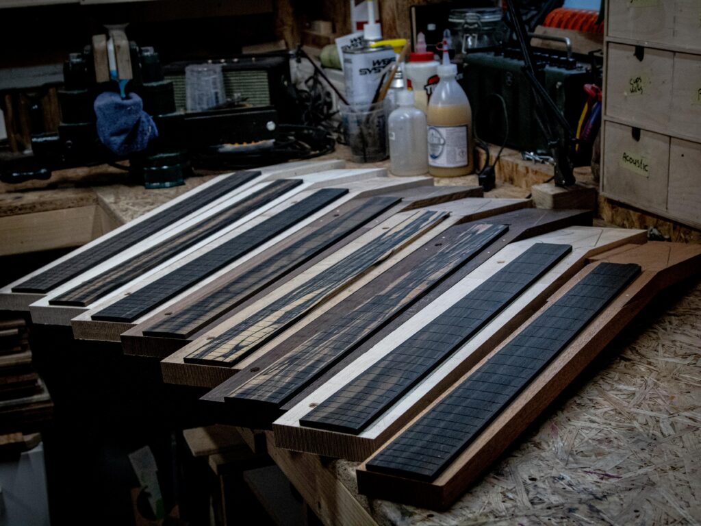 Parts of guitars being prepared in Wel Guitars workshop. 