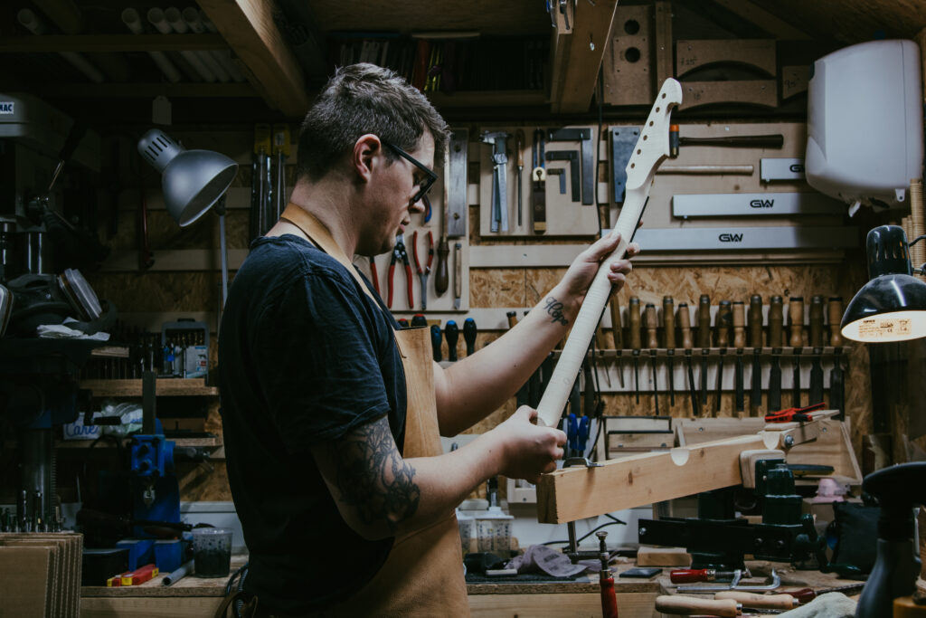 Maikel in the workshop making his guitars out of west system epoxy 